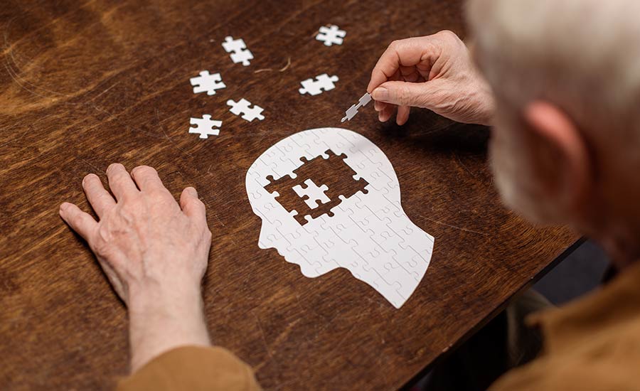 A dementia patient completing a puzzle