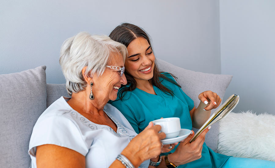 A caregiver comforting a dementia patient