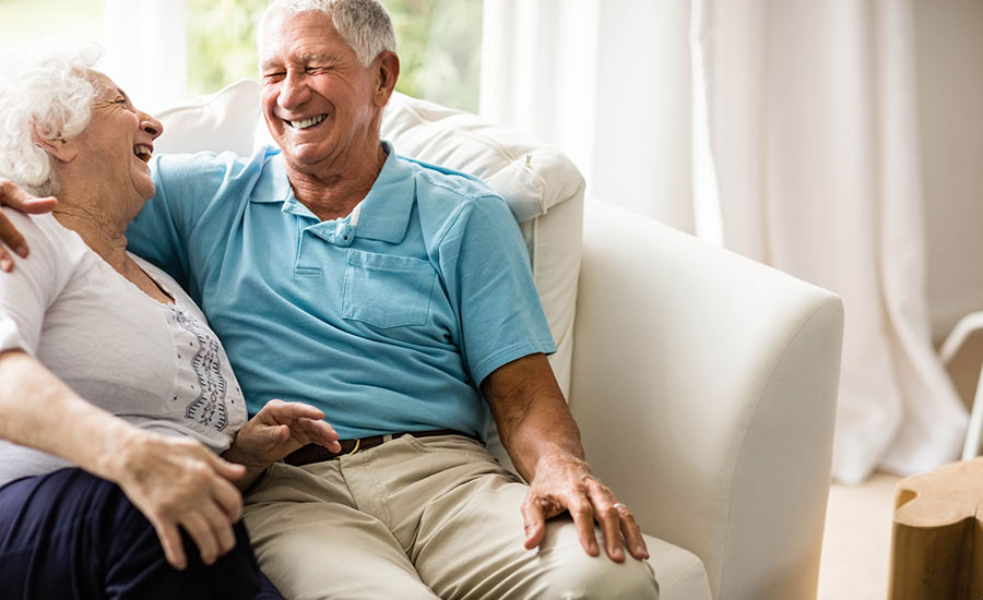 An elderly couple having fun