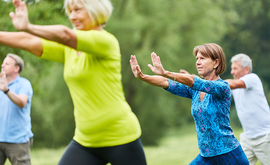 A group of seniors doing tai chi